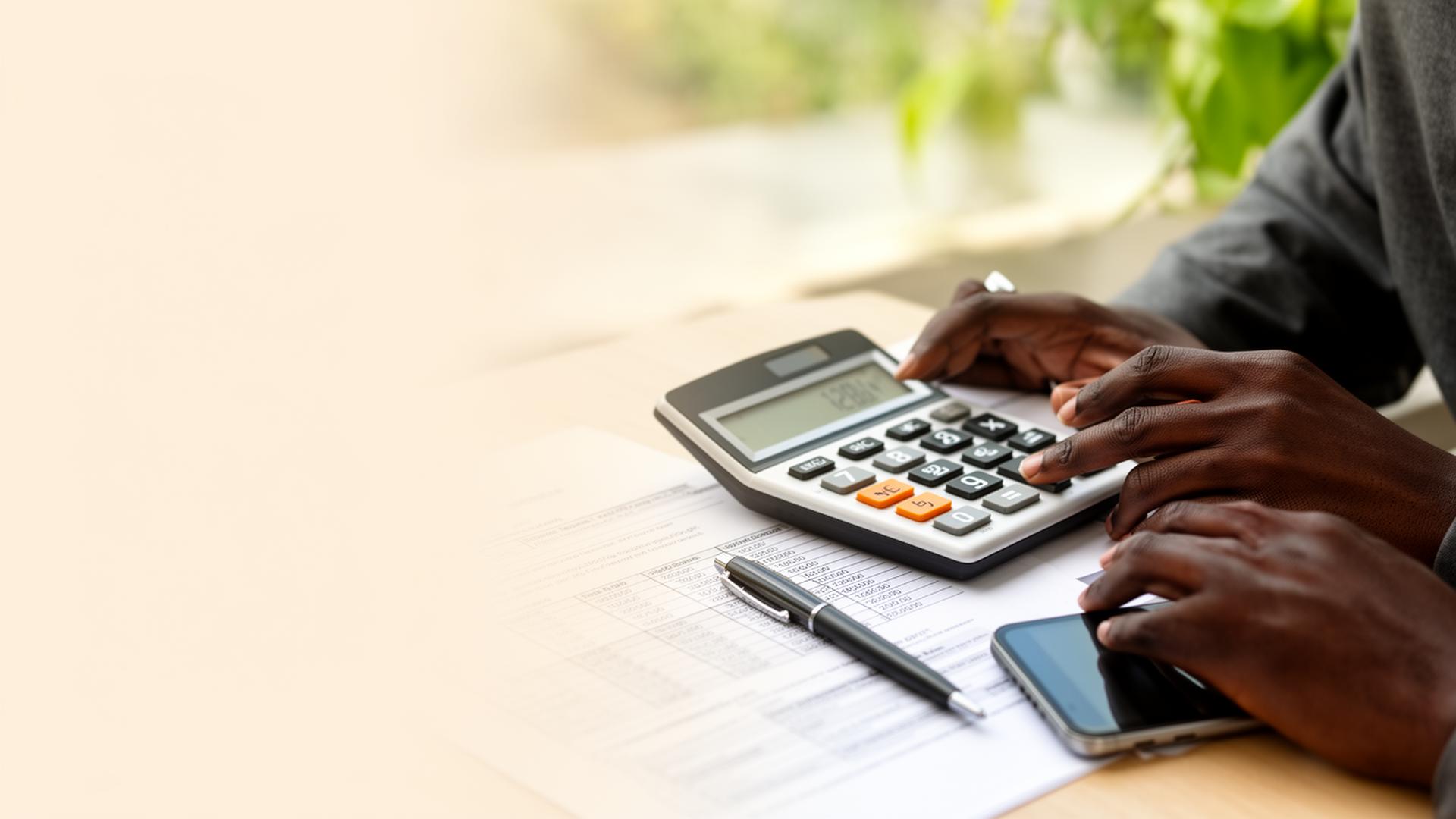 A loan officer calculating affordable repayment terms for a Kenyan borrower